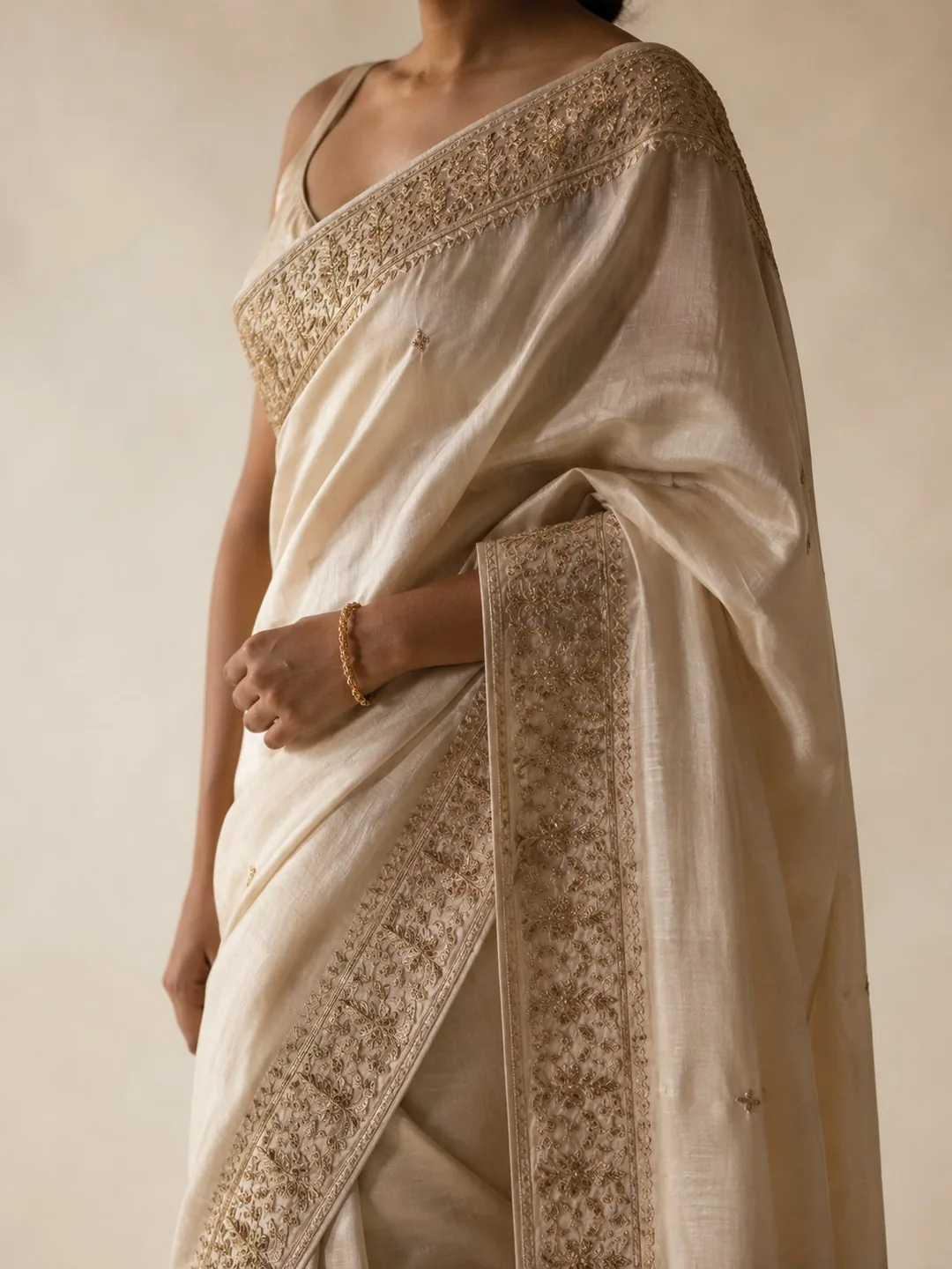The Eternal Saree — ivory silk with antique gold zardozi border